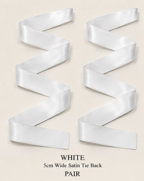 White satin ribbon tie-backs included